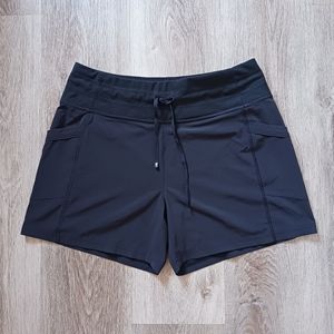 Lucy high rise active shorts with pockets